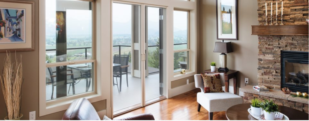 Retractable screen doors enhance the look of a family room and enhance privacy and security