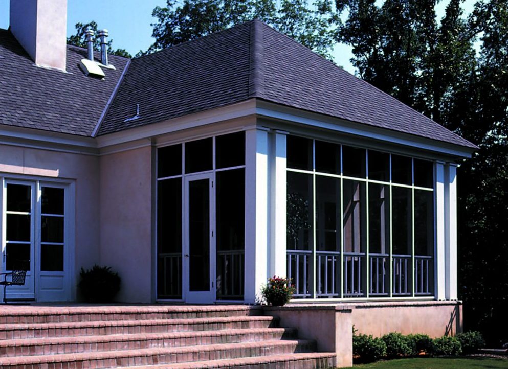 Exterior of home featuring vista security screens on windows and doors