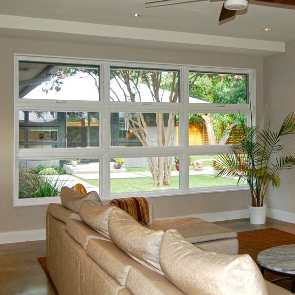 Wood windows installed in a family room with an interesting outlook to the street.