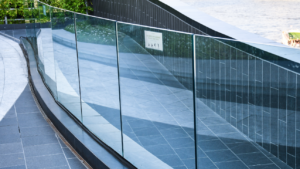 Safety glass balustrade showcasing the strength and clarity of safety glass in a modern commercial setting, providing both security and aesthetic appeal.